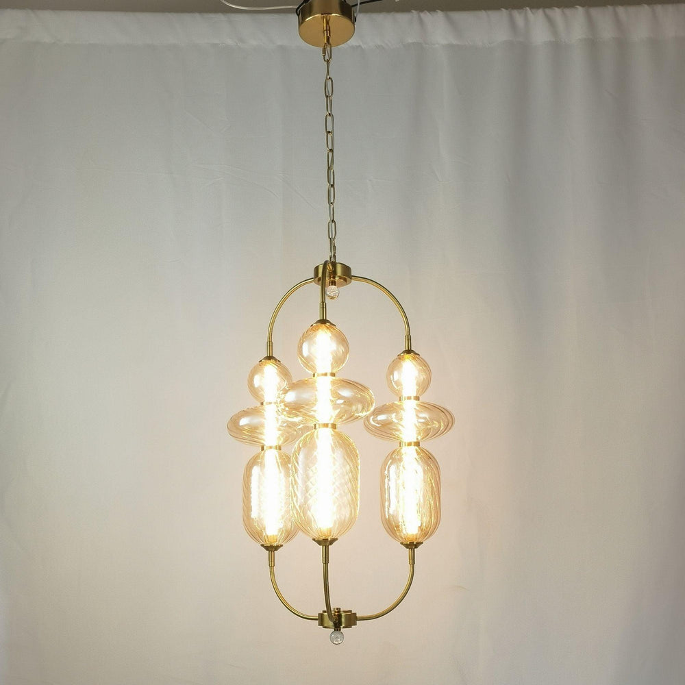 
                      
                        Gold Hardware and Amber Glass LED Chandelier by Gloss (A1893/2) - Ashoka Lites
                      
                    