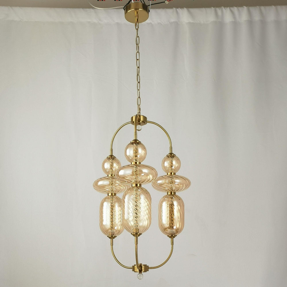 
                      
                        Gold Hardware and Amber Glass LED Chandelier by Gloss (A1893/2) - Ashoka Lites
                      
                    